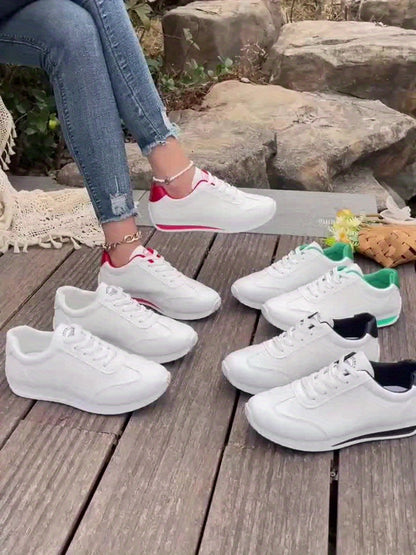 Sneakers casual leggere da donna, alla moda, bianche con dettagli neri, rossi, verdi e gialli, scarpe da corsa con suola in EVA, design basso con lacci per tutte le stagioni