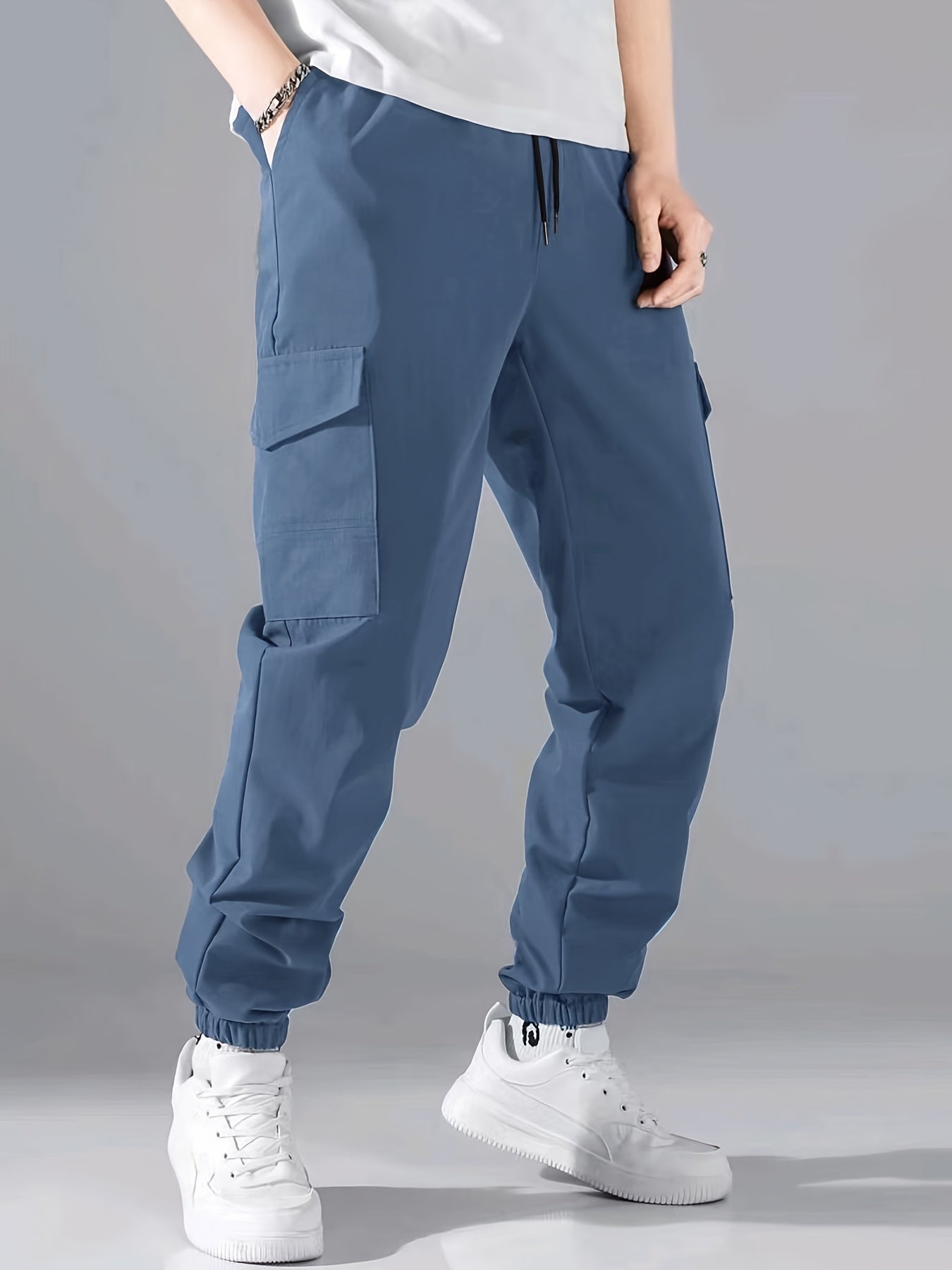Pantaloni cargo alla moda, pantaloni da uomo con coulisse e tasche multiple, pantaloni casual larghi da esterno, pantaloni da lavoro da uomo per attività all'aperto, stile streetwear hip hop