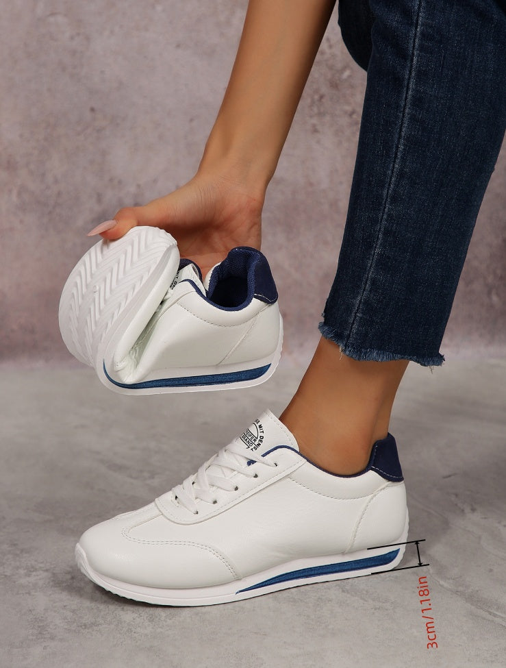 Sneakers casual leggere da donna, alla moda, bianche con dettagli neri, rossi, verdi e gialli, scarpe da corsa con suola in EVA, design basso con lacci per tutte le stagioni