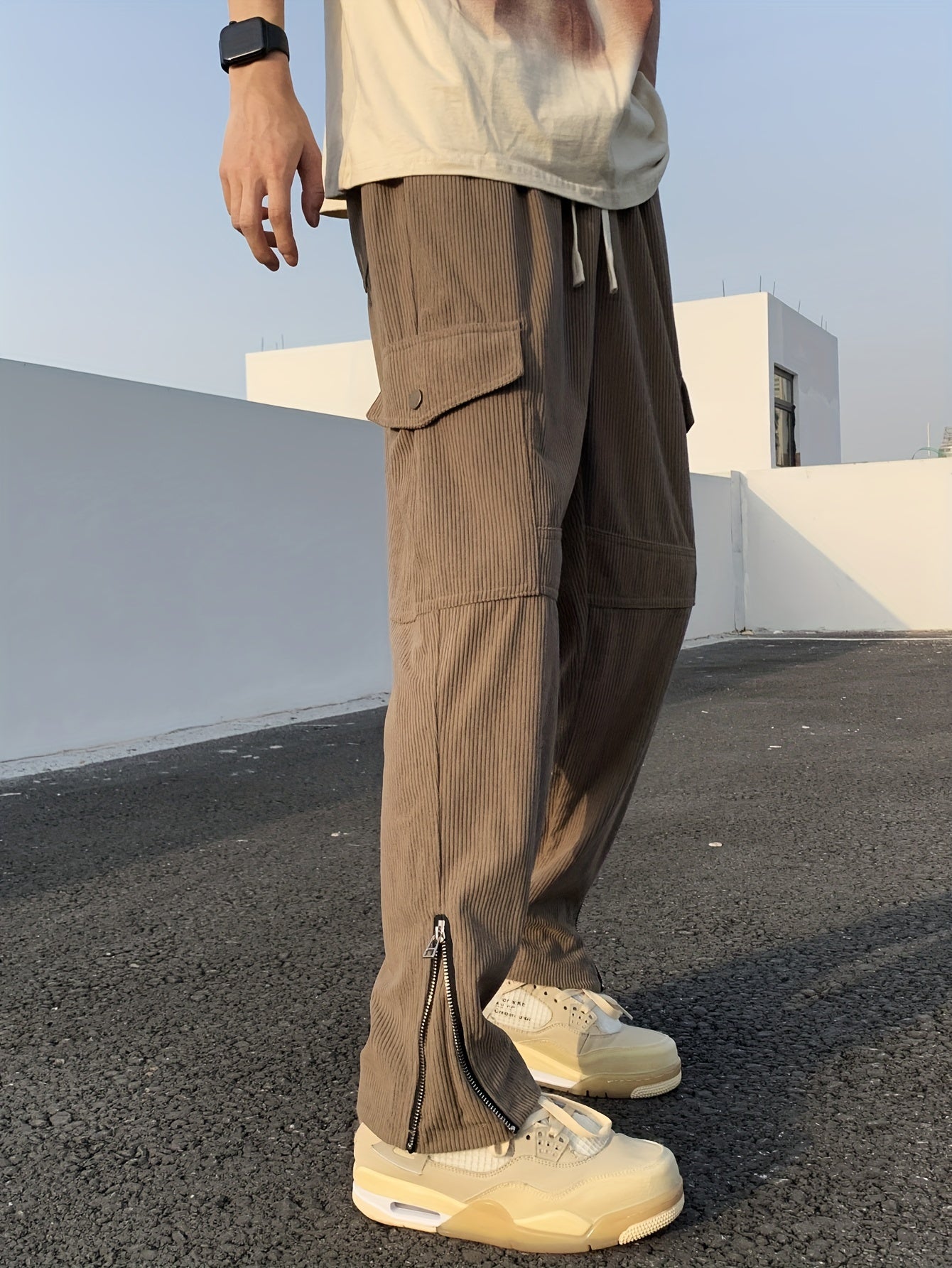 Pantaloni cargo in velluto a coste alla moda, pantaloni da uomo con coulisse e tasche multiple, pantaloni casual larghi da esterno, pantaloni da lavoro da uomo per attività all'aperto, stile streetwear hip hop